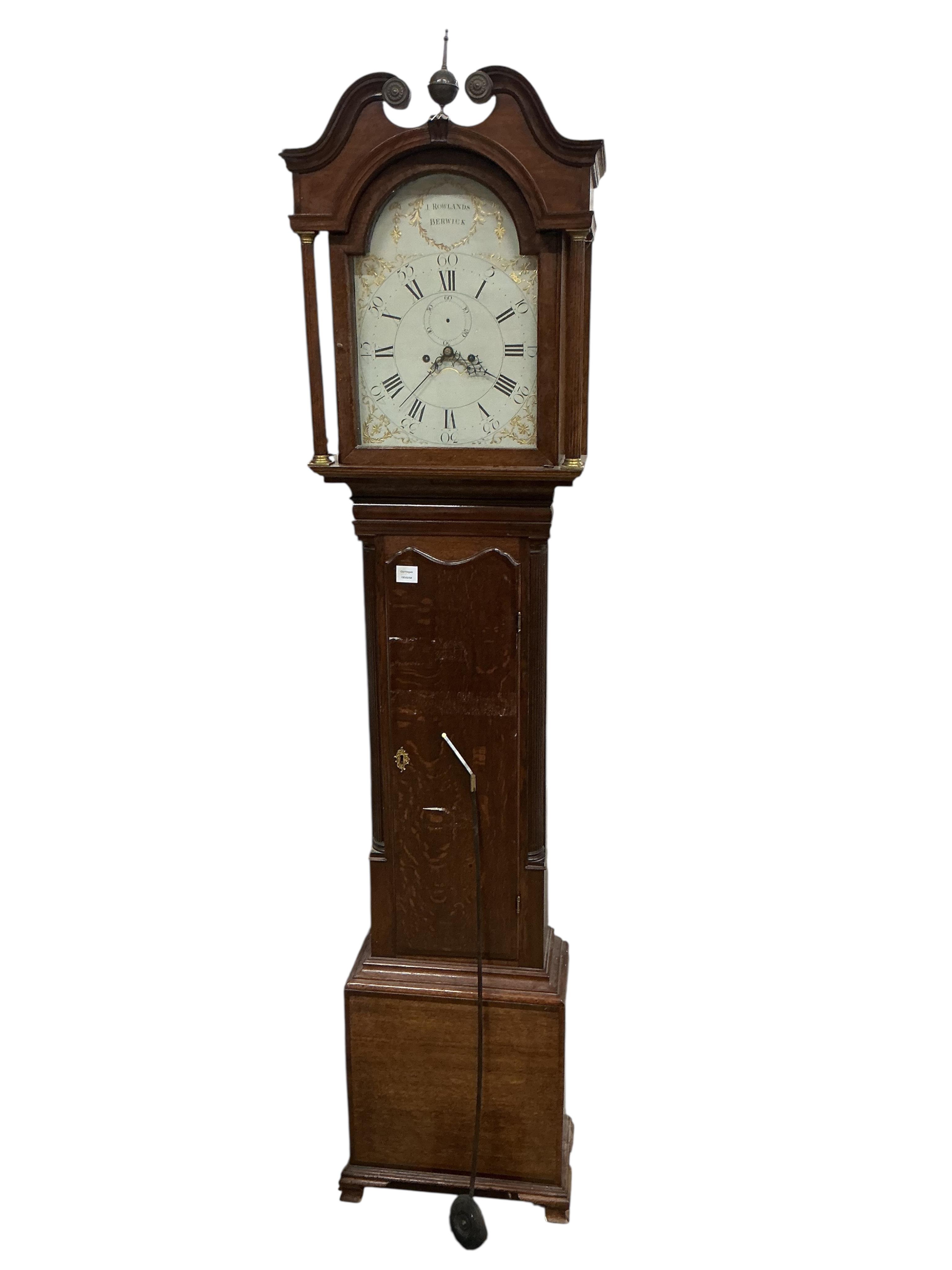 An early 19th century oak and mahogany eight day longcase clock, height 230cm